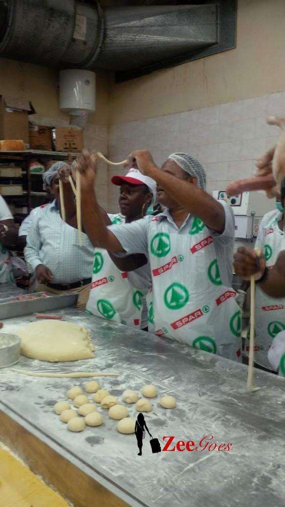 Rolling dough around the hot dog